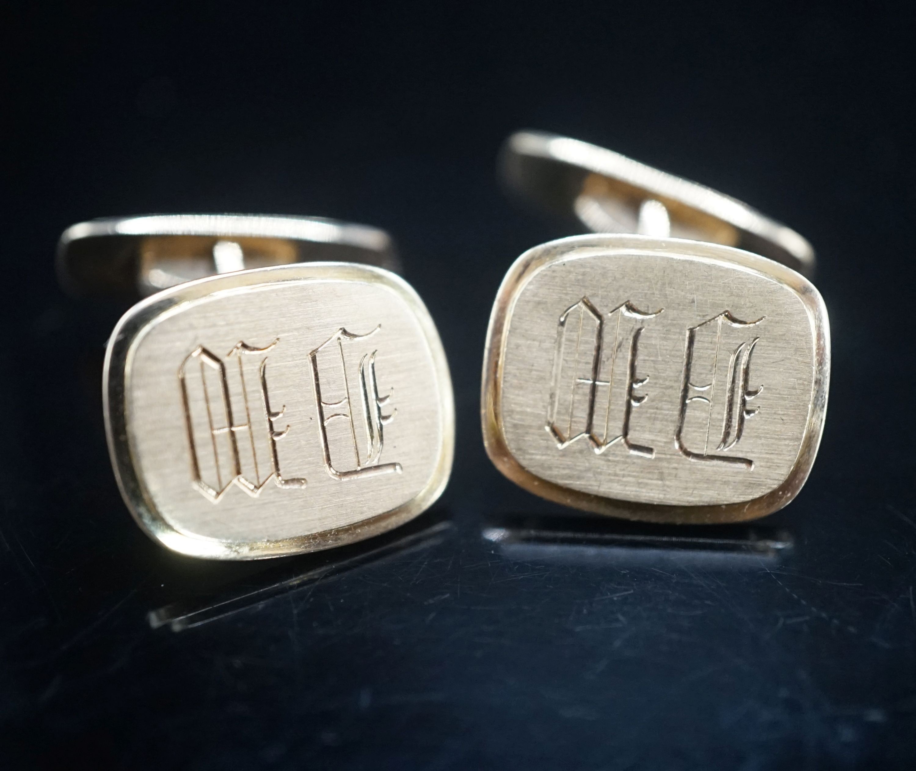 A pair of 585 yellow metal cufflinks, with engraved initials, 18.2 grams.